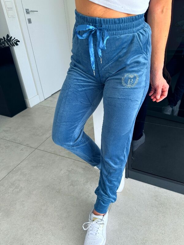 Damskie spodnie welurowe z cekinami N703 lazurowy