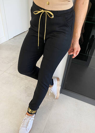 Spodnie ze złotą aplikacją i wiązaniem w pasie M703 czarne