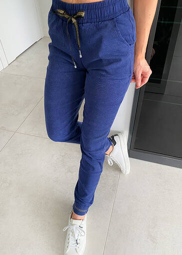 Spodnie jeansowe ze ściągaczem i greckim wzorem na nogawce N087 niebieskie 